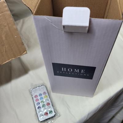 Sale Photo Thumbnail #880: Not sure how to set up the shelving unit but it was still in the box