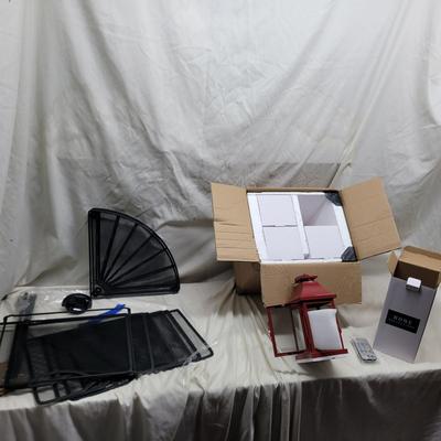 Sale Photo Thumbnail #878: Not sure how to set up the shelving unit but it was still in the box