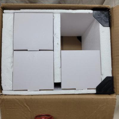 Sale Photo Thumbnail #881: Not sure how to set up the shelving unit but it was still in the box