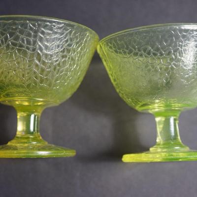 Sale Photo Thumbnail #3: Lot 1

L.E Smith Glass  EArly 20th century.Vaseline crackle glass sherbet dessert set 
unique set of sherbets with plates. 
three mold blown 
There are two colors in the mix. One is the vaseline color for the sherbets except two are yellow . the plates ar