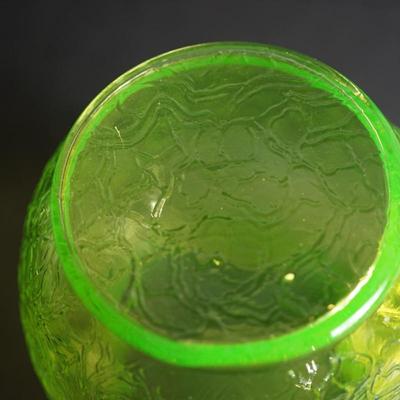 Sale Photo Thumbnail #19: Lot 3

Original vaseline glass pitcher with lid. 
Maker unknown, Tiffin , L.E Smith, / not marked and no match found

The yellow glass has a green hue
glows with black light uranium glass
Height of pitcher base to the finail on lid :10"
Width at the cente