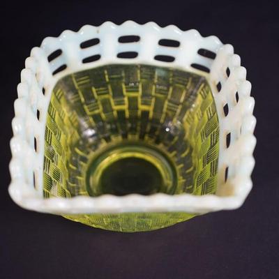 Sale Photo Thumbnail #35: At auction is a grouping of three Fenton candy dishes in the basket weave pattern, 
Lacy edge of opalescent glass. 
Mold blown 
early 1930's 
Uranium content glows under UV light 

round bowl measures: 7" across the top 
Height : 1 3/4" 
condition; very g