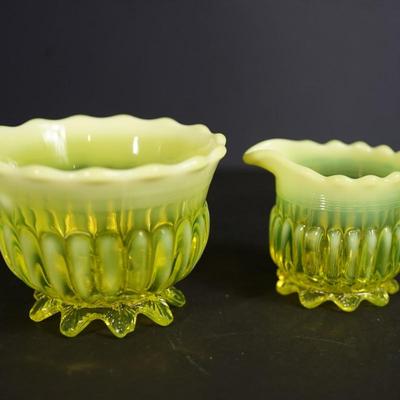 Sale Photo Thumbnail #38: 1890's Lady Caroline pattern creamer and sugar
yellow pattern glass 
opalecent rim
Height of the creamer is 2"
Height of the sugar bowl 2 1/2"

Condition: the creamer has severl areas of surface cracks due to temperature changes or stress cracks.I please 