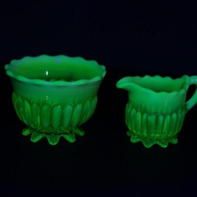 Sale Photo Thumbnail #41: 1890's Lady Caroline pattern creamer and sugar
yellow pattern glass 
opalecent rim
Height of the creamer is 2"
Height of the sugar bowl 2 1/2"

Condition: the creamer has severl areas of surface cracks due to temperature changes or stress cracks.I please 