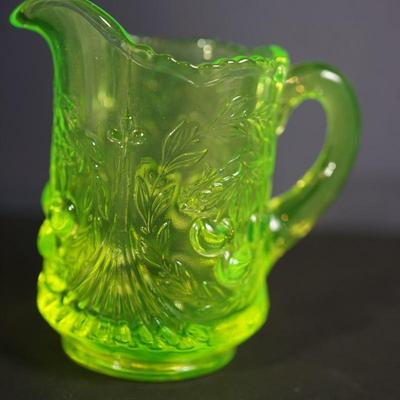 Sale Photo Thumbnail #44: creamer of 4 1/2" to 4 3/4" two mold glass of vaseline glass color UV light fluorescent 
the color is the light green vaseline color and perhaps should be more of a yellow color for this pattern
I question that it is a reproduction from the 60's or ?