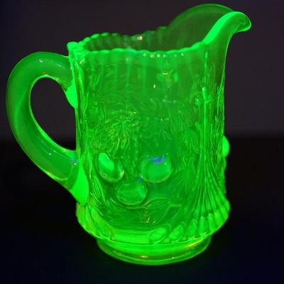 Sale Photo Thumbnail #47: creamer of 4 1/2" to 4 3/4" two mold glass of vaseline glass color UV light fluorescent 
the color is the light green vaseline color and perhaps should be more of a yellow color for this pattern
I question that it is a reproduction from the 60's or ?