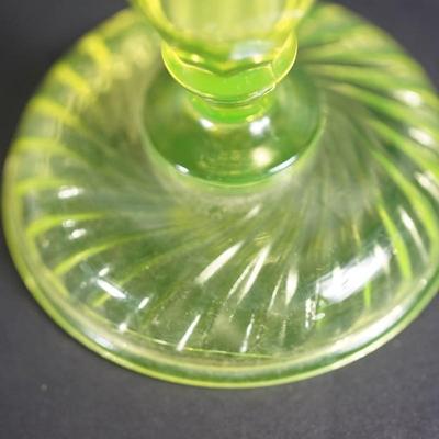Sale Photo Thumbnail #50: 1930's vaseline glass footed candy dish, no lid. The  rim  has rounded edge so maybe did not have a lid orginal just over 5" and in good condition 
the candleholders are 4" in height, good condition 
UV light fluorescent