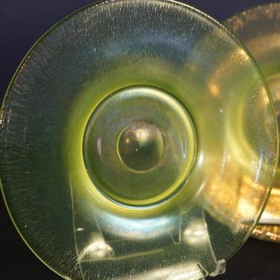 Sale Photo Thumbnail #61: group of 3 8" vaseline glass stretch glass plates. The have the look of favrille glass, multi color in the right light, 
UV light fluorescent
condition: no chips or cracks. the centers may need additional cleaning as slighty foggy. please see photo.