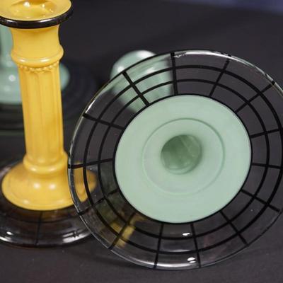 Sale Photo Thumbnail #84: satin glass with clear base with webb pattern of black . 
2 sage color at 8 1/4" and a mustard color satin finish at 6" 
sage pair are in very good condition
6" mustard colored one is cracked where the candle sits. interior crack that does not go all the 