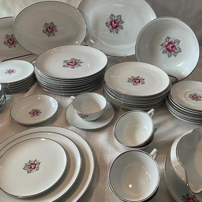 Sale Photo Thumbnail #134: There are 8 plus place settings along with serving dishes.  All in great shape, no chips.  60 total pieces