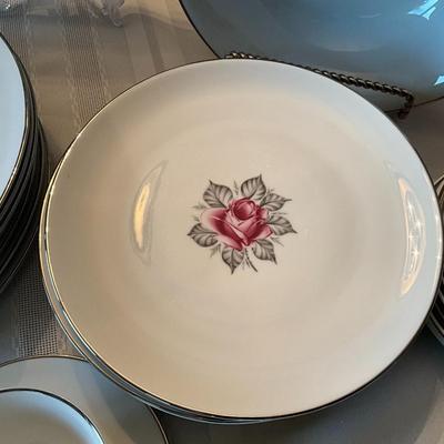 Sale Photo Thumbnail #132: There are 8 plus place settings along with serving dishes.  All in great shape, no chips.  60 total pieces