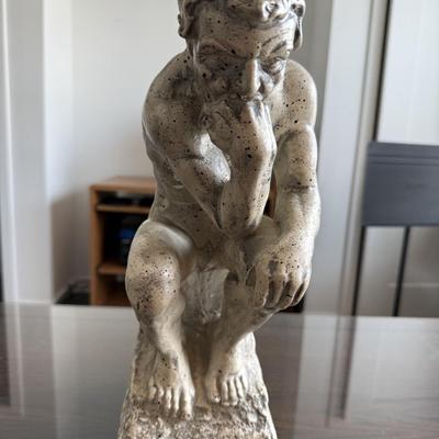 “The Thinker” resign statue