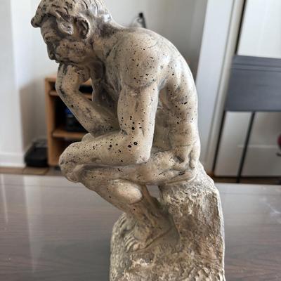 “The Thinker” resign statue