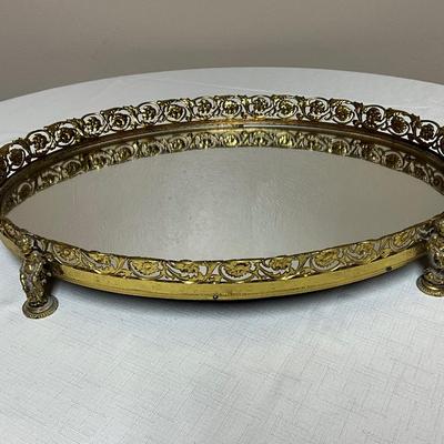 Sale Photo Thumbnail #177: Gold-tone metal filigree vanity tray with cherub feet
Fabulous shape