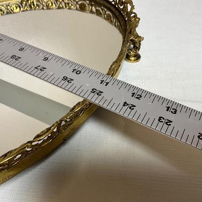 Sale Photo Thumbnail #180: Gold-tone metal filigree vanity tray with cherub feet
Fabulous shape