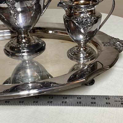 Sale Photo Thumbnail #192: Tea Service Set includes teapot, covered sugar bowl, creamer, and 19in serving tray.
Beautiful condition