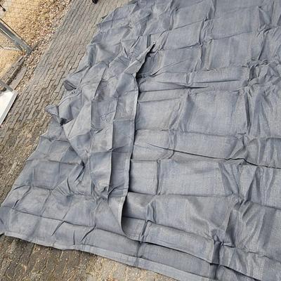 Sale Photo Thumbnail #1010: This is a grey, breathable camping groundsheet or awning carpet. 
It is made from a durable, non-perishable woven material that allows air and moisture to pass through. 
The tight weave acts as an effective barrier to insects and worms while protecting th