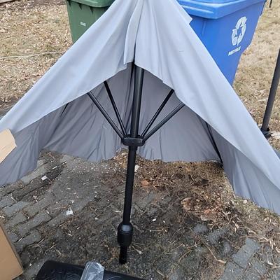 Sale Photo Thumbnail #1029: Base gets filled with sand, awning cranks open