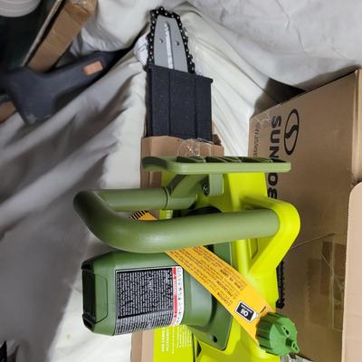 Sale Photo Thumbnail #1055: Comes with 2 batteries, 2 chargers, extension for blower, saw blade and chain