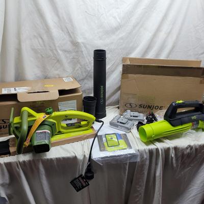 Sale Photo Thumbnail #1051: Comes with 2 batteries, 2 chargers, extension for blower, saw blade and chain