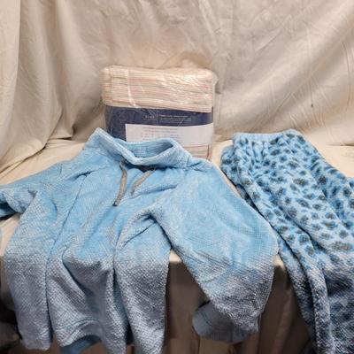 Sale Photo Thumbnail #1065: A split king sheet set gives you an extra fitted sheet and these are the softest pajamas I've ever touched