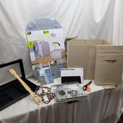 Sale Photo Thumbnail #1106: One cube has writing on it, the other looks new, you can scratch your back and many other things after you buy this lot