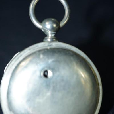 Sale Photo Thumbnail #115: antique open face pocket watch
Works : 389164
key wind- key is missing 
Hampden
case:7926 
beveled crystal has scratches, case has small dent on the back. there is a small area of discoloration indents on the back also see photo
one of the  minute hand of