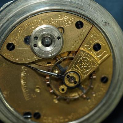 Sale Photo Thumbnail #118: antique open face pocket watch
Works : 389164
key wind- key is missing 
Hampden
case:7926 
beveled crystal has scratches, case has small dent on the back. there is a small area of discoloration indents on the back also see photo
one of the  minute hand of