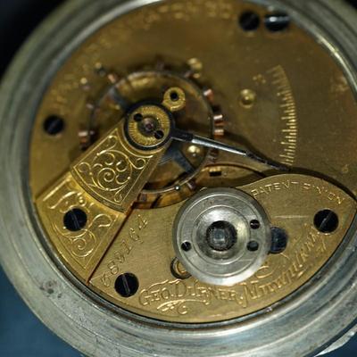 Sale Photo Thumbnail #116: antique open face pocket watch
Works : 389164
key wind- key is missing 
Hampden
case:7926 
beveled crystal has scratches, case has small dent on the back. there is a small area of discoloration indents on the back also see photo
one of the  minute hand of