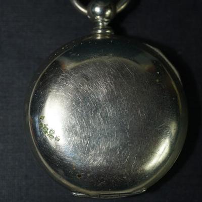 Sale Photo Thumbnail #109: antique open face pocket watch
Works : 389164
key wind- key is missing 
Hampden
case:7926 
beveled crystal has scratches, case has small dent on the back. there is a small area of discoloration indents on the back also see photo
one of the  minute hand of