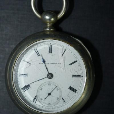 Sale Photo Thumbnail #108: antique open face pocket watch
Works : 389164
key wind- key is missing 
Hampden
case:7926 
beveled crystal has scratches, case has small dent on the back. there is a small area of discoloration indents on the back also see photo
one of the  minute hand of