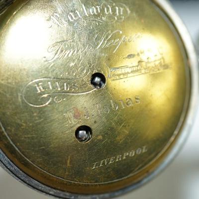 Sale Photo Thumbnail #124: antique pocket watch. silverplated /case coin? 
Case: 52810
no markings found inside the works, 
bezel and crystal intact and in good condition 
key wind- key is missing, 
The watch is selling as is. Not working 
engraved case of trees and cottage on one 