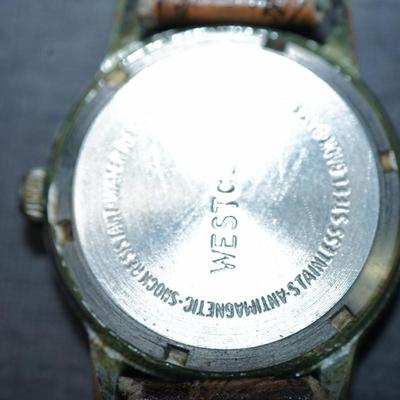 Sale Photo Thumbnail #134: three mens watches selling as is. They are in good condition, not working, 
need intricate cleaning 
Jules :3325
westclox; vintage but needs cleaning and has wear around the crown
Timex Indiglo nice gold and silver band.
I have not removed the backs but h