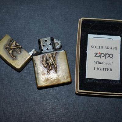 Sale Photo Thumbnail #144: 1994 marlboro zippo lighter brass, In original box with papers. 
The outside has wear and the brass is discolored in areas on the front and back. This could be cleaned but some prefer not to restore the finish, There are no dents or damage to the case. th