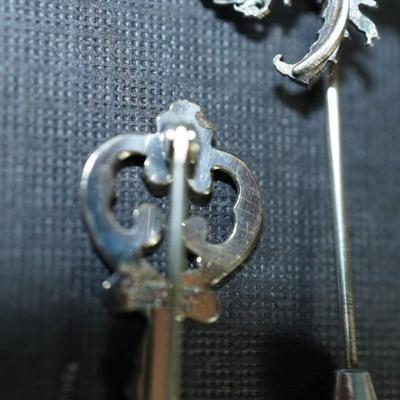 Sale Photo Thumbnail #161: Grouping of 6 jewelry items stamped sterling. 
The weight (without the sterling framed lapis pendant by Verna Craig ) is 20 grams. I didnt include the pendant because of the stone setting 
The chains  on two of them are sterling but not the Verna Craig ne