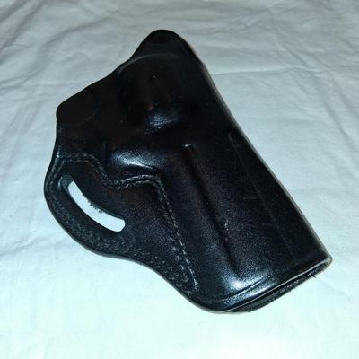 Sale Photo Thumbnail #110: Holds a revolver or small piece