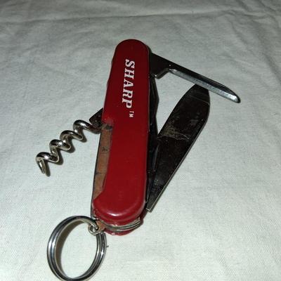 Sale Photo Thumbnail #200: This tool is heavy duty. No thin tools. Nice configuration of cork screw, hole punch,  & more.