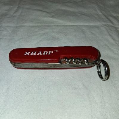 Sale Photo Thumbnail #199: This tool is heavy duty. No thin tools. Nice configuration of cork screw, hole punch,  & more.