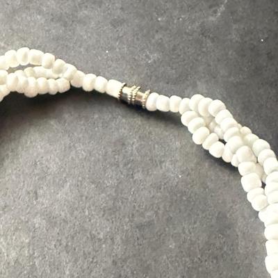 Vintage beaded necklace featuring irregular turquoise-colored shell chips necklace