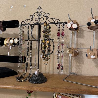 Sale Photo Thumbnail #2: Pins, watches, Necklaces, Video camera, Pens and more.

Display items not included.