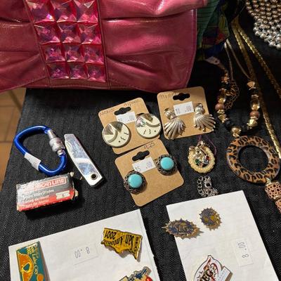 Sale Photo Thumbnail #10: Pins, watches, Necklaces, Video camera, Pens and more.

Display items not included.