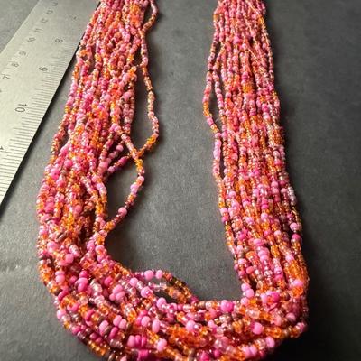 Multilayer pink beaded statement necklace with shell chips beautiful