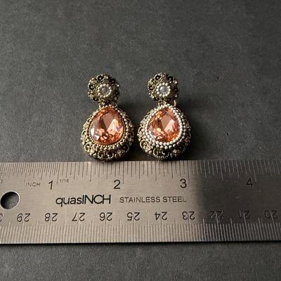 blush pink drop earrings with a vintage-style gold-tone finish.