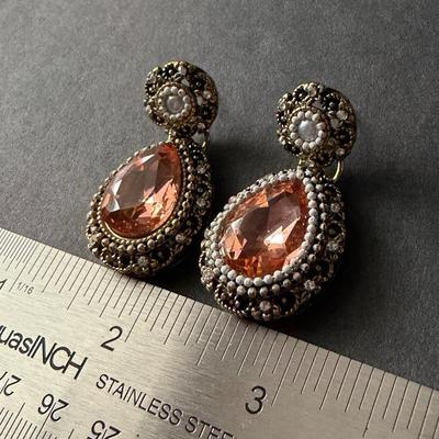 blush pink drop earrings with a vintage-style gold-tone finish.