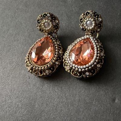 blush pink drop earrings with a vintage-style gold-tone finish.