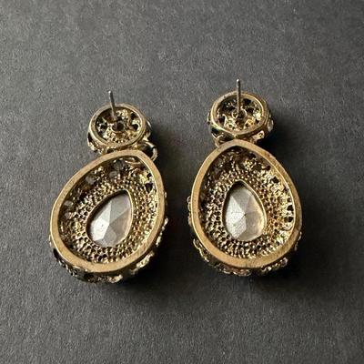 blush pink drop earrings with a vintage-style gold-tone finish.