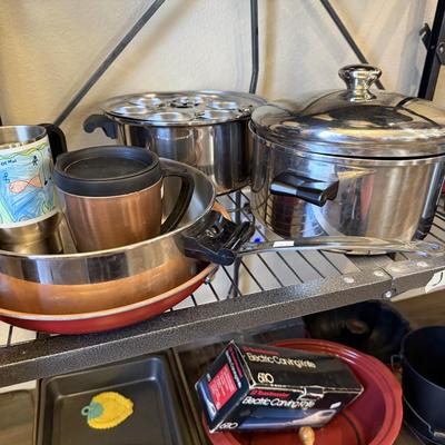 Sale Photo Thumbnail #21: Pots and Pans, cake pan, metal cups, electric knife and skillet.