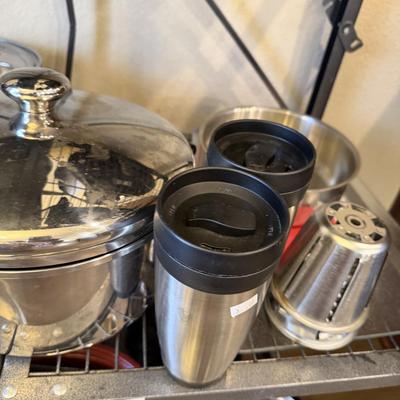 Sale Photo Thumbnail #22: Pots and Pans, cake pan, metal cups, electric knife and skillet.