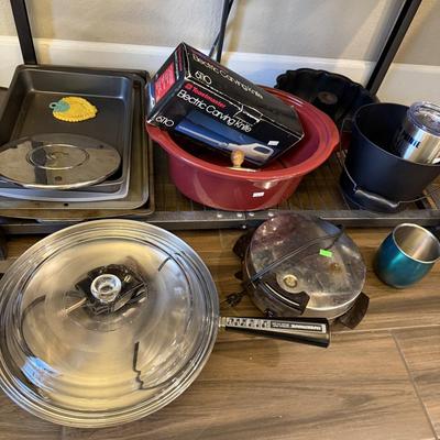 Sale Photo Thumbnail #19: Pots and Pans, cake pan, metal cups, electric knife and skillet.