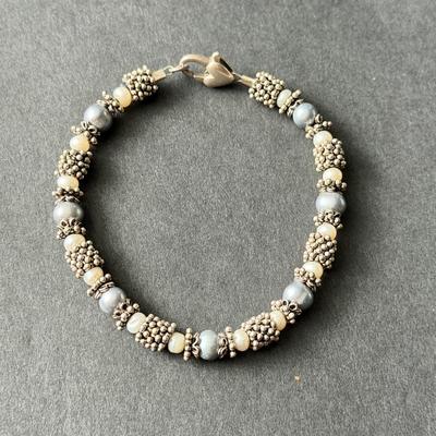 Beautiful silver tone pearl bracelet